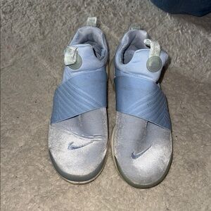 Nike Blue Sneakers with Cross-Strap Design